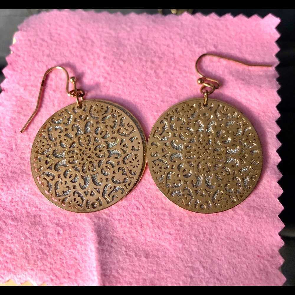 Rose coloured dangling earrings
